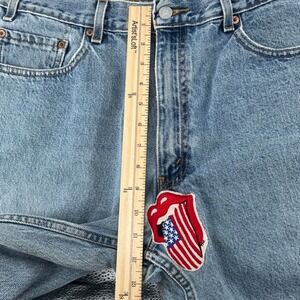 Vintage Levis 550 Relaxed Fit Tapered Leg Jeans Blue Rolling Stones Patch Mens